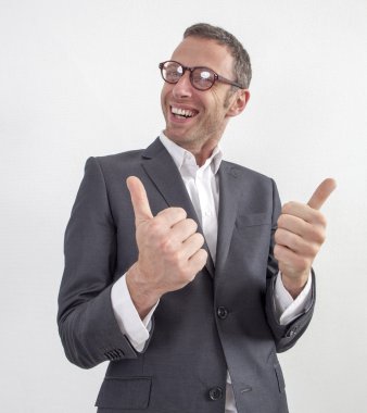 excited 40s man with checked shirt pointing finger to show something on side