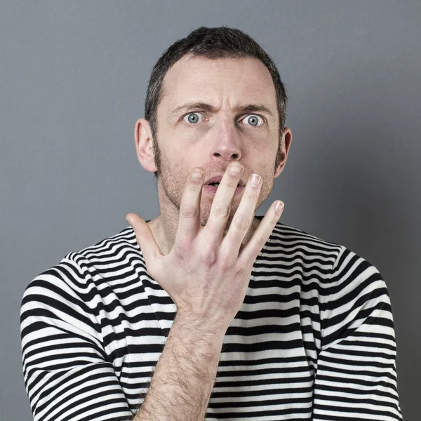 Male adolescence concept with red hooded sweater and fun hand gesture — Stock Photo, Image