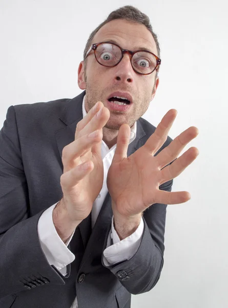 Excited 40s man with checked shirt pointing finger to show something on side — Stock Photo, Image