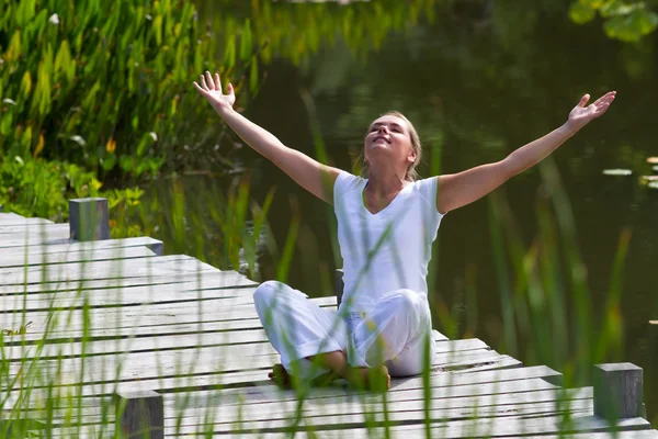 Zen 20s blond girl revitalizing,water environment — Stock Photo, Image