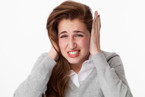 nervous 20s woman suffering from headache grinding teeth