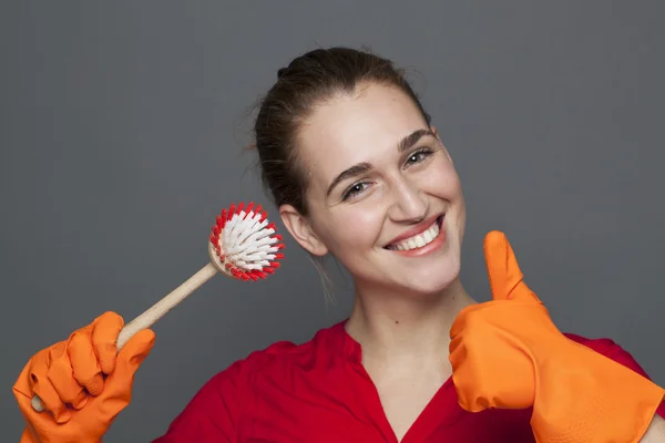 Cheerful young woman approving household cleaning for fun hygiene obsession — Stock Photo, Image
