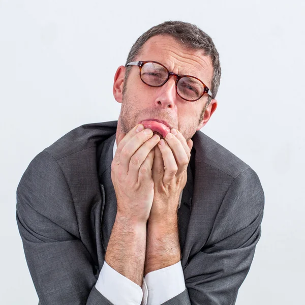 Pouting middle aged businessman begging to avoid stress and burnout — Stock Photo, Image