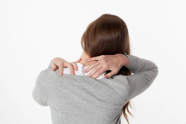 20s mujer en vista trasera con la columna vertebral fatiga y tensión — Foto de Stock