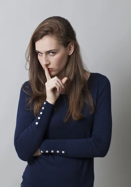 Thinking attractive young woman acting like a teacher for mystery — Stock Photo, Image