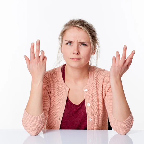 Complaining young blond woman expressing herself with angry hands up — Stock Photo, Image