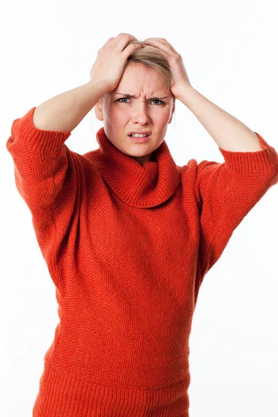 Annoyed young blond woman suffering, holding her head for misunderstanding — Stock Photo, Image