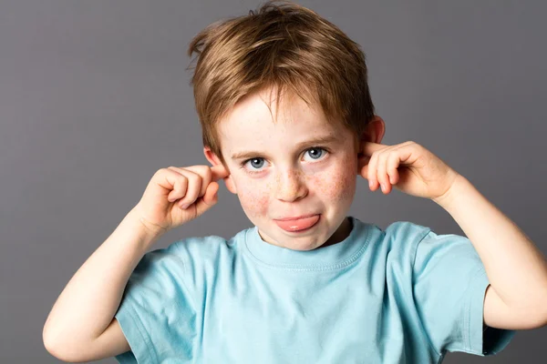 Happy little boy not listening, sticking out his tongue — Stock Photo, Image