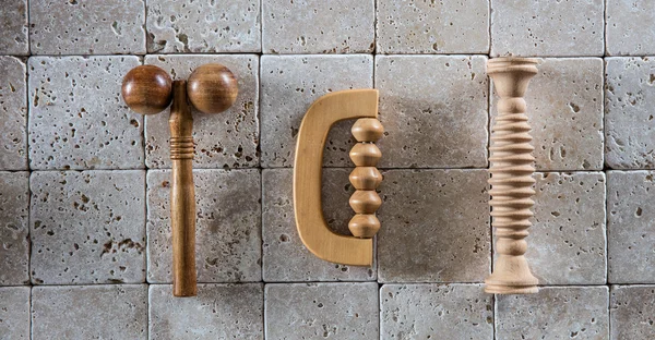 Still life of massage rollers for spa wallpaper, top view — Stock Photo, Image