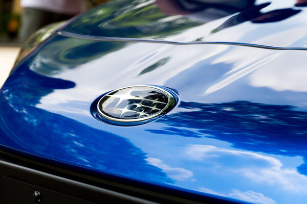Subaru logo on car