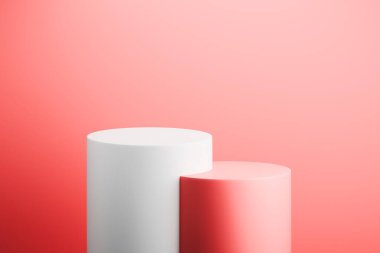 Ürün yerleştirmek için yumuşak mercan duvarına dayanan iki beyaz silindir..