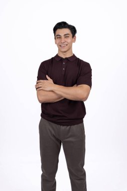 Professional and confident male model posing on white background.