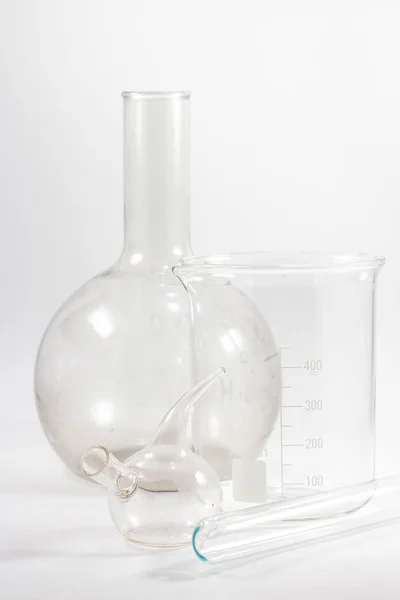 Beaker on a white background — Stock Photo, Image