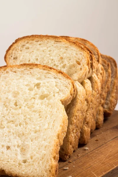 Fresh sliced bread on a white background — Stock Photo, Image