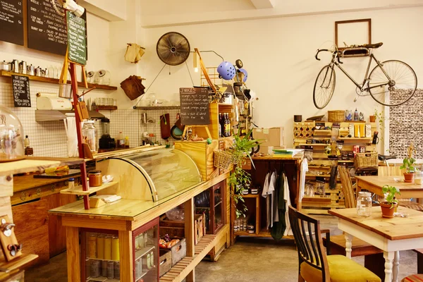 Coffee shop with bicycle on wall interior — Stock Photo, Image