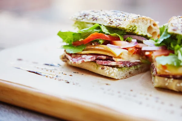 Healthy sandwiches on wooden board — Stock Photo, Image