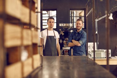 men in roast coffee beans workspace clipart