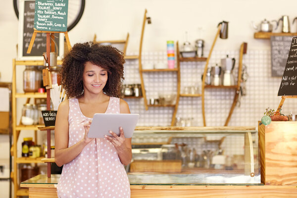 Beautiful woman using digital tablet