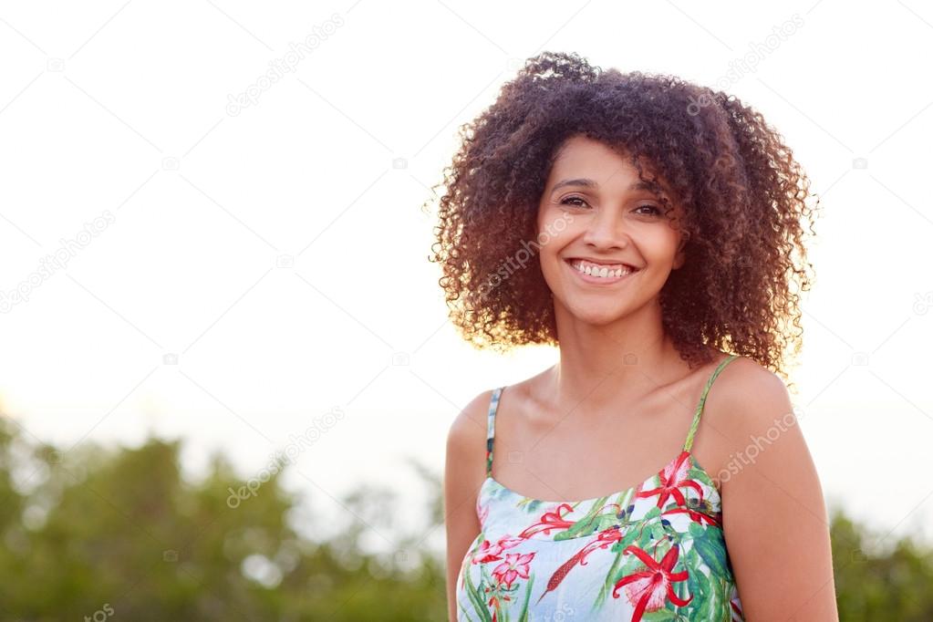 Beautiful woman smiling in park