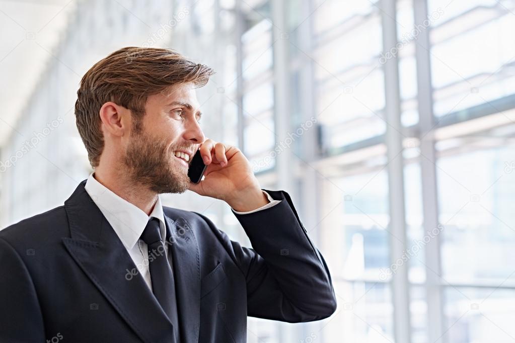 corporate executive talking on mobile phone