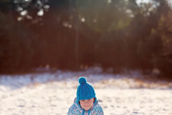 Girl giving naughty smile to camera — Stock Photo, Image