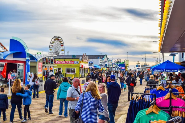 The roller coaster at the amusement park on the Santa Monica Pier in Santa Monica 66 sign, California — Stock Photo, Image