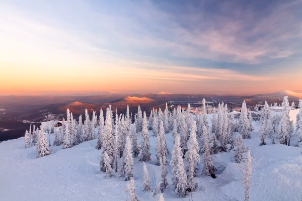 Winter view from the top of the mountain at sunset background — Stock Photo, Image