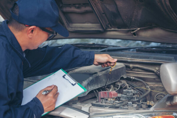 Mechanic car service auto garage in automotive mobile center. Technician workshop repair engine motor vehicles service mechanical engineering business. Automobile mechanic hands car repairs technic
