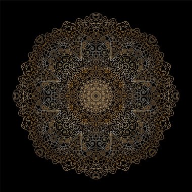 Siyah kağıt üzerinde altın dairesel şekli.