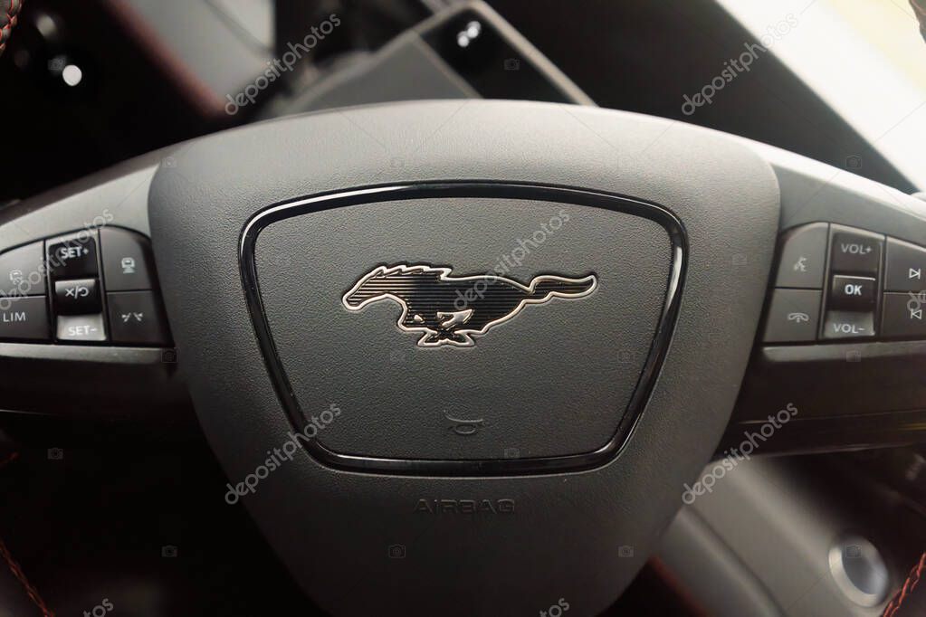 Vaasa, Finland - October 24, 2025 - Ford Mustang Mach-E 2021 steering wheel with a logo.