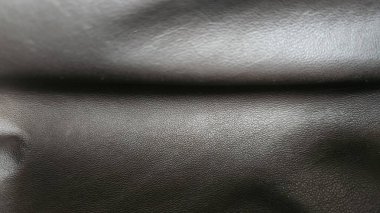Doğal desenli parlak siyah derinin arkaplan resmi.