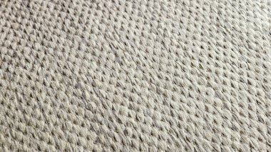 Düzensiz granüler desenler ve mimari, materyal ve tasarım kavramları için ideal mat bitiş içeren ayrıntılı nötr yüzey dokusu.