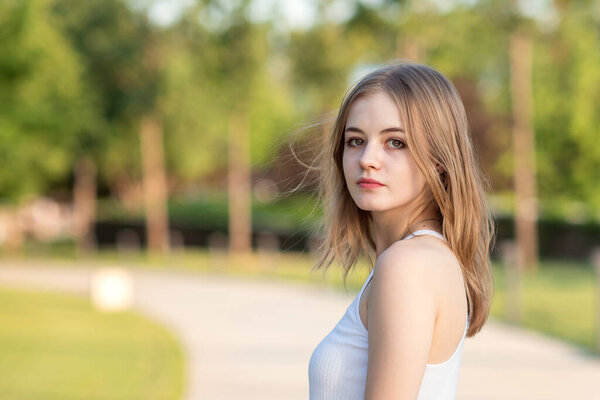portrait of a teenage girl in the park
