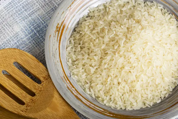 Puñado de granos de arroz — Foto de Stock