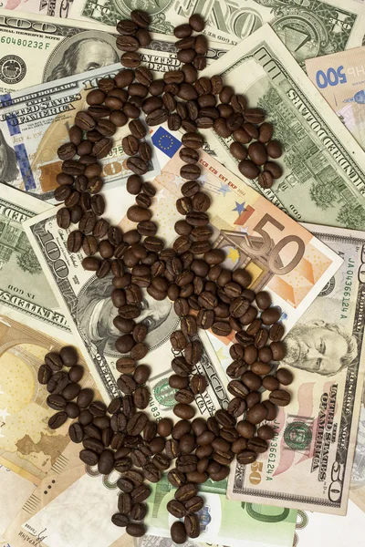 Koffie en geld — Stockfoto