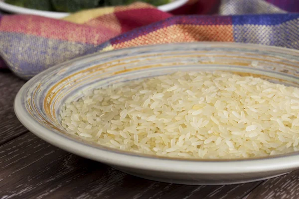 Puñado de granos de arroz — Foto de Stock