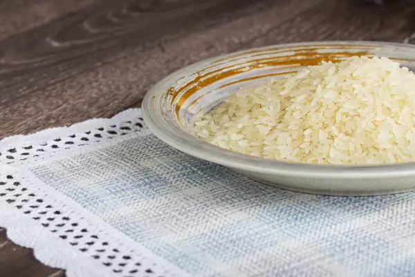 Puñado de granos de arroz — Foto de Stock