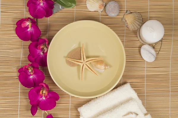 Spa and Wellness setting with natural accessories  Stones, towel, Orchid — Stock Photo, Image