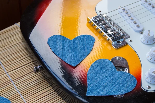 Heart of denim on the guitar. Happy friendship day — Stock Photo, Image