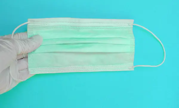 의사는 배경에 장갑을 바이러스 마스크를 유행병 공기로 전염되는 Sars 독감에 — 스톡 사진