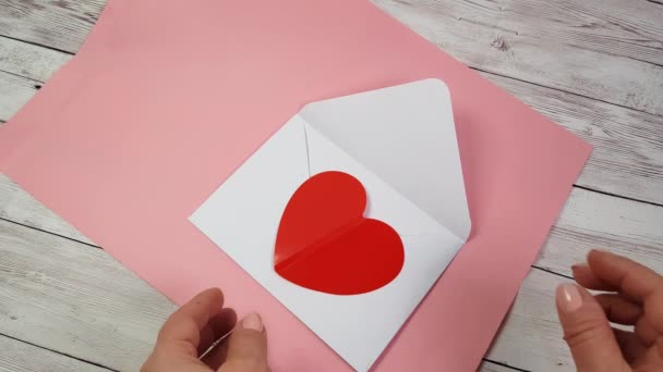 Women Hands Open White Envelope Take Out Valentine Card Shape — Stock Video