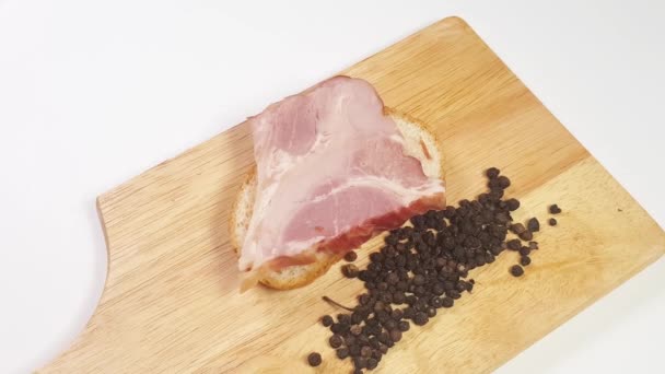 Slow Motion Video Cutting Board Bread Ham Black Pepper White — Stock Video