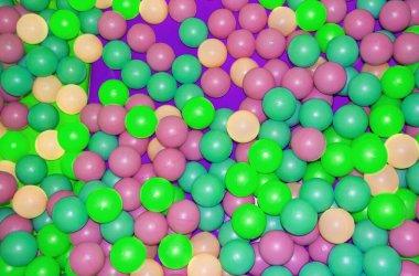 Arka plan, oyun bahçesinde renkli plastik toplar, çocukların gelişimi ve oyunları için topları olan havuz.