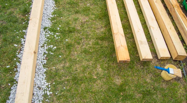 Close Preparation Painting New Wooden Boards Lying Grass Next Can — Stock Photo, Image