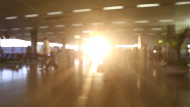 Busy Airport Crowd with Sunset in background — Stock Video