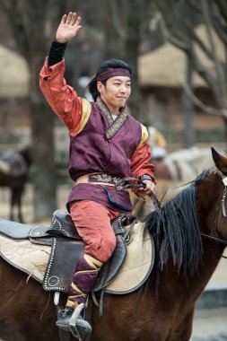 Participant a the Equestrian Feats act