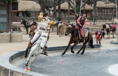 Participant a the Equestrian Feats act