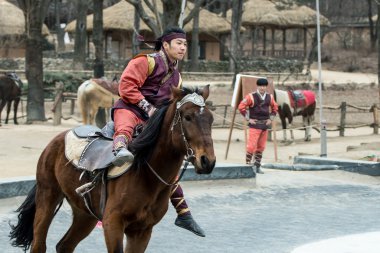 Participant a the Equestrian Feats act