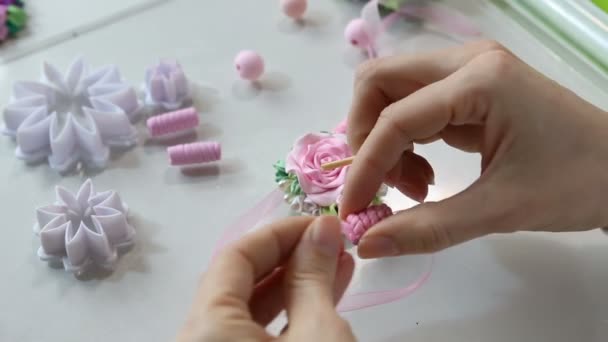 Artist makes jewelry from polymer clay, process. Workshop — Stock Video