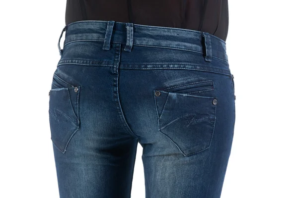 Жінка повернулася в джинсах — стокове фото